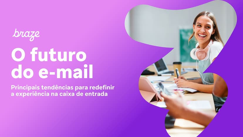 a woman wearing headphones is smiling while sitting at a table with other people .