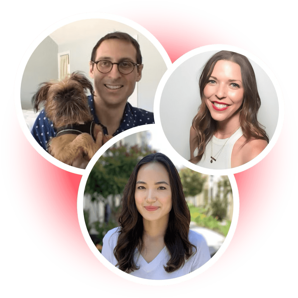 a man is holding a small dog and two women are smiling