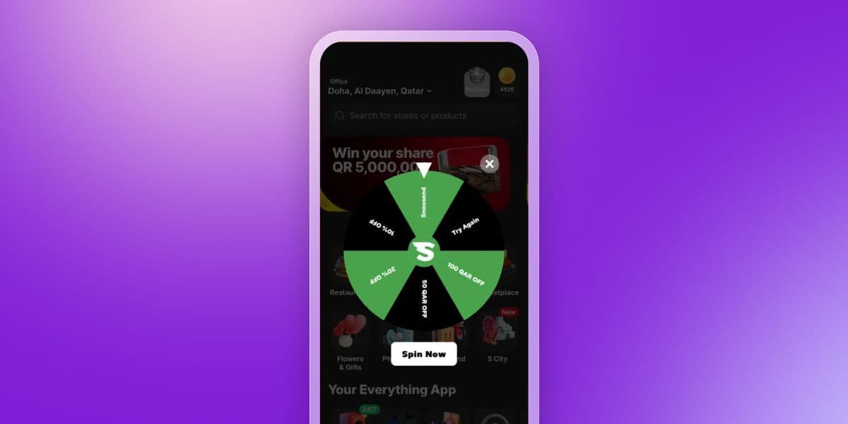 A smartphone displaying a spin-the-wheel game for rewards on a dark-themed mobile app.