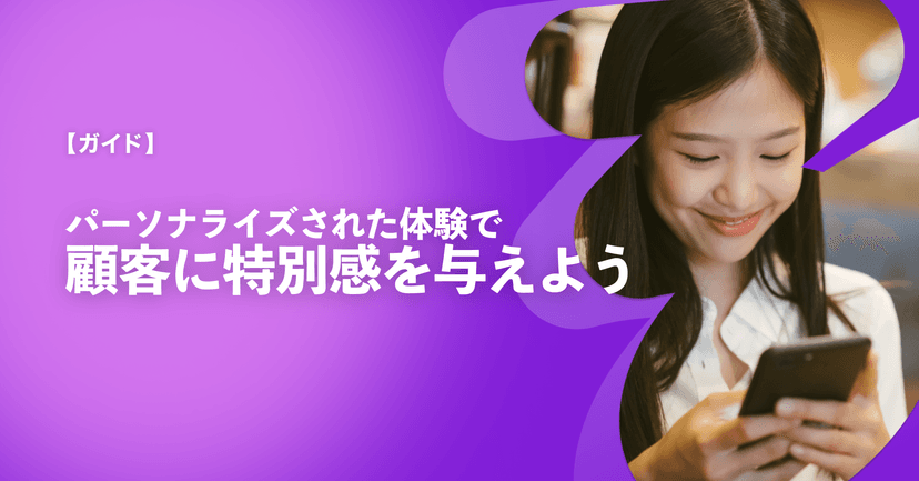 a woman is smiling while looking at her cell phone