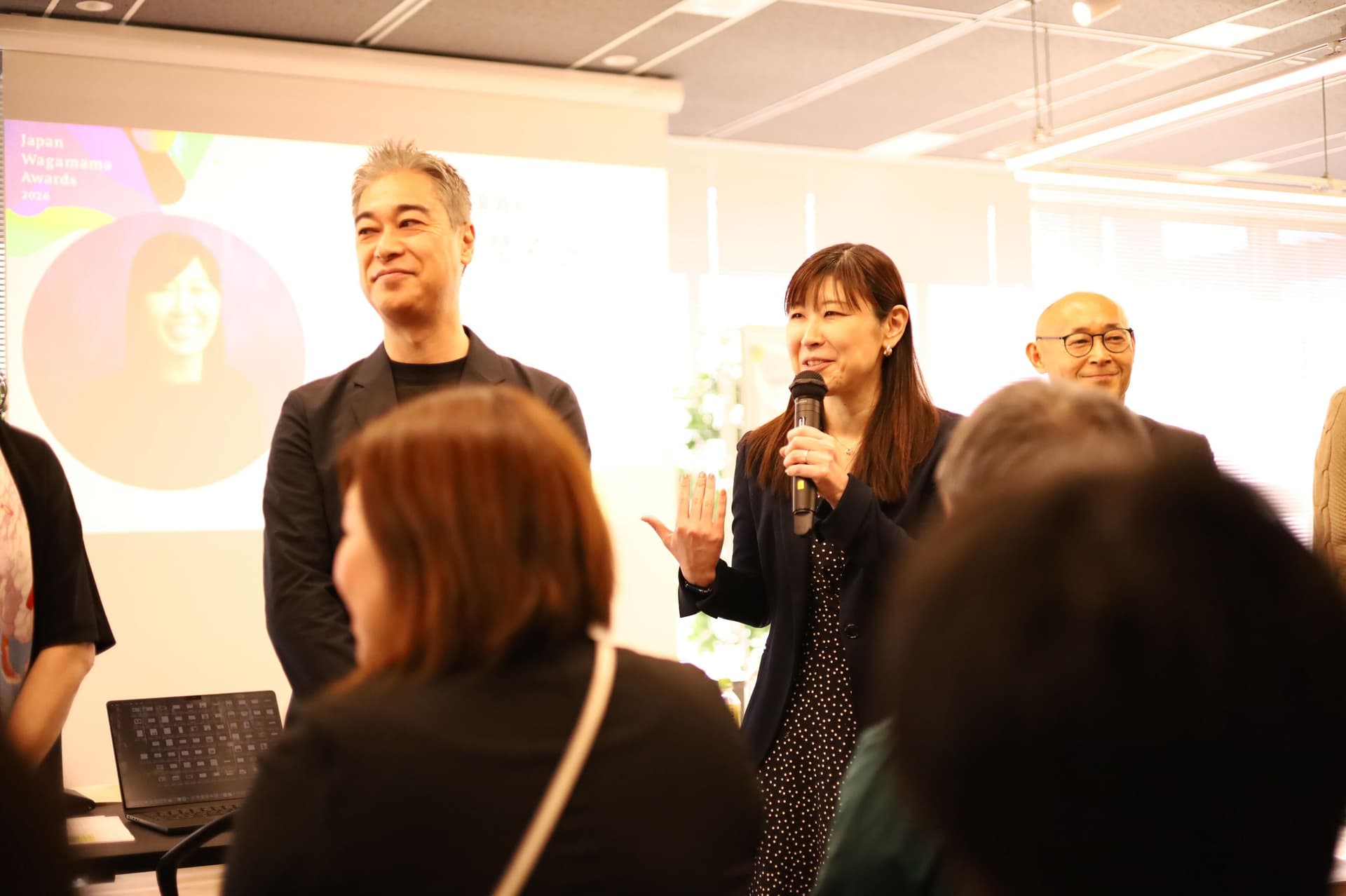 審査員2名(Senior Director, Marketing の 柿野 拓と、Manager, Expert Services の 太田 潤子)