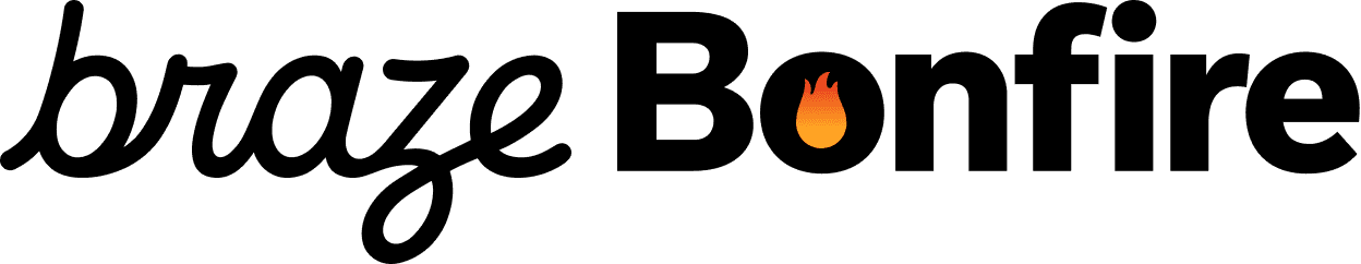 a single flame is floating in the air on a black background .