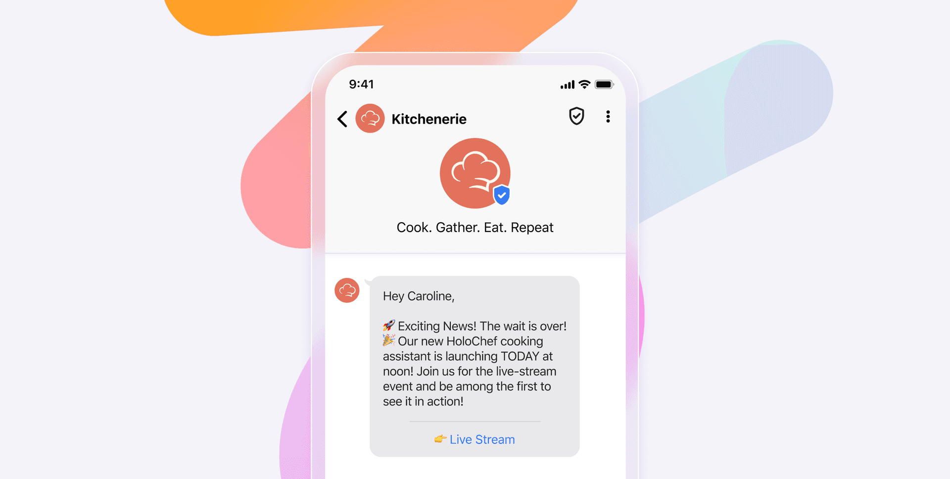 a phone screen shows a message from kitchenerie