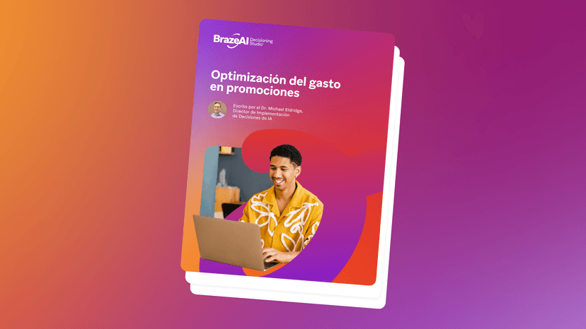 Cover of an e-book titled 'Optimización del gasto en promociones' (Optimization of spending on promotions), featuring a smiling man using a laptop.