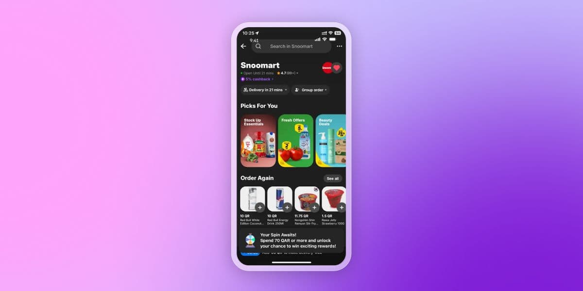 A smartphone displaying the Snoomart grocery app with product listings and offers.