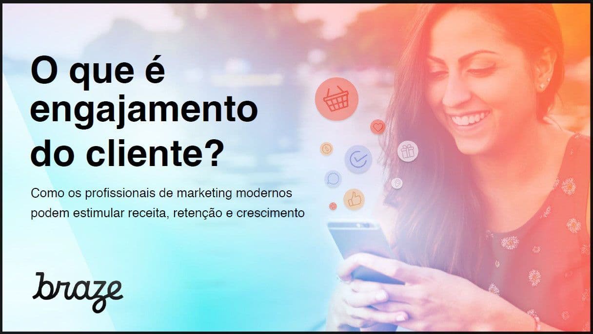 a woman is smiling while looking at her cell phone .