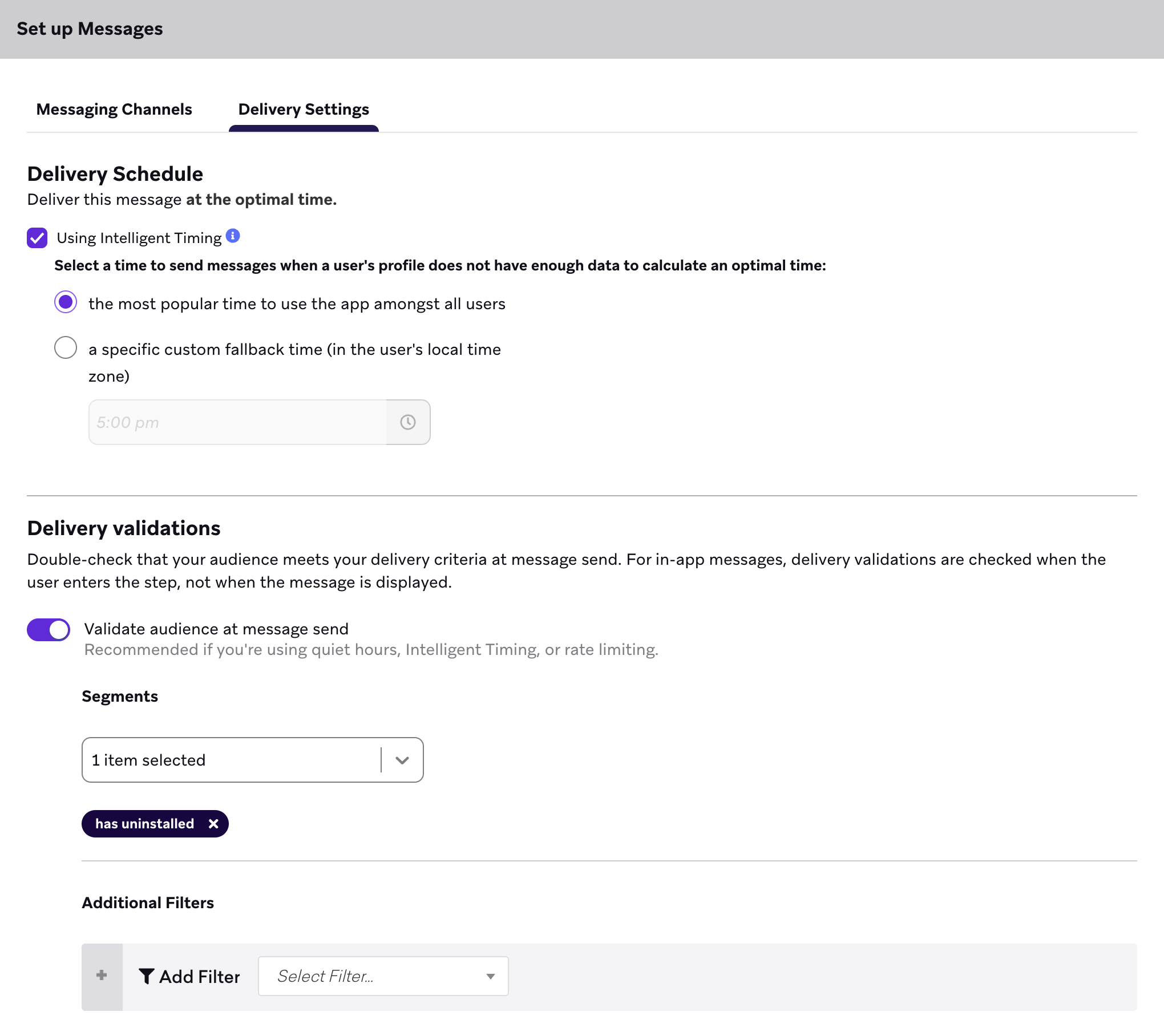 The Delivery Settings tab for Message component settings. Quiet Hours are enabled, and the checkbox for Using Intelligent Timing is selected to deliver the message at an optimal time. Delivery Validations are enabled to validate the audience at message send.