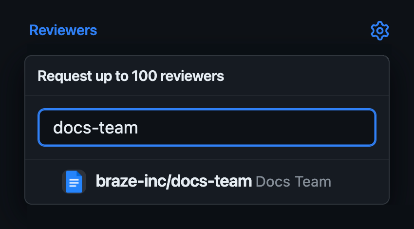 An example pull request with "docs-team" added as the reviewer.