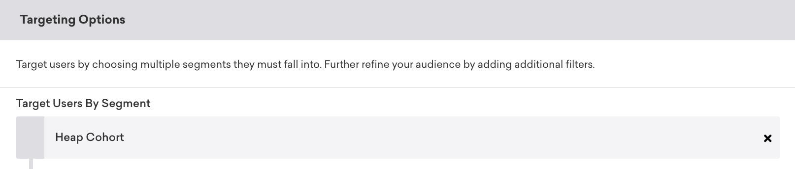 In the Braze campaign builder on the targeting step, the "Target users by segment" filter is set to "Heap cohort".