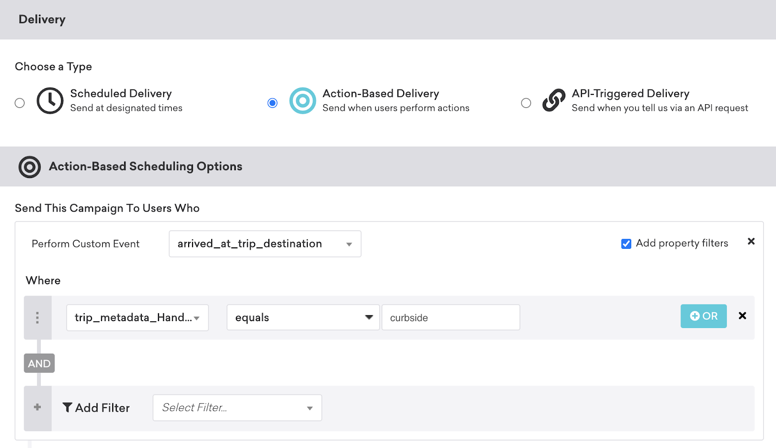 An action-based delivery campaign showing that the campaign will be delivered when the "arrived_at_trip_destination" custom event occurs, and the "trip_metadata" equals "curbside".