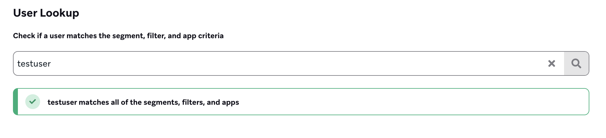 A user lookup of "testuser" triggers an alert stating, "testuser matches all of the segments, filters, and apps.