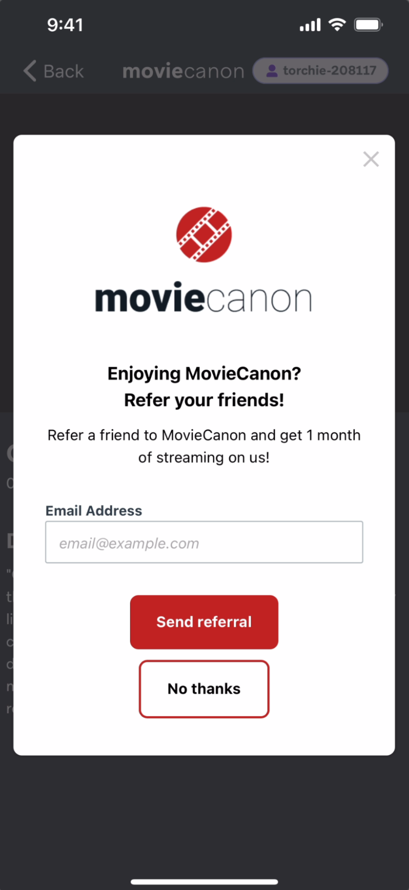 Eine In-App-Nachricht in der MovieCanon-App: „Gefällt Ihnen MovieCanon? Empfehlen Sie es Ihren Freunden!“ mit der Option, Ihre E-Mail-Adresse einzugeben, um eine Empfehlung zu versenden.