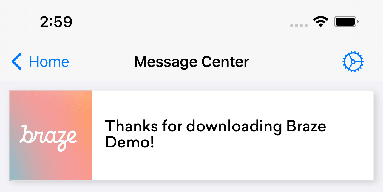 Eine Banner-Content-Card. Eine Banner-Content-Card zeigt rechts neben dem Banner ein Bild mit dem Text „Vielen Dank für den Download der Braze-Demo!“.