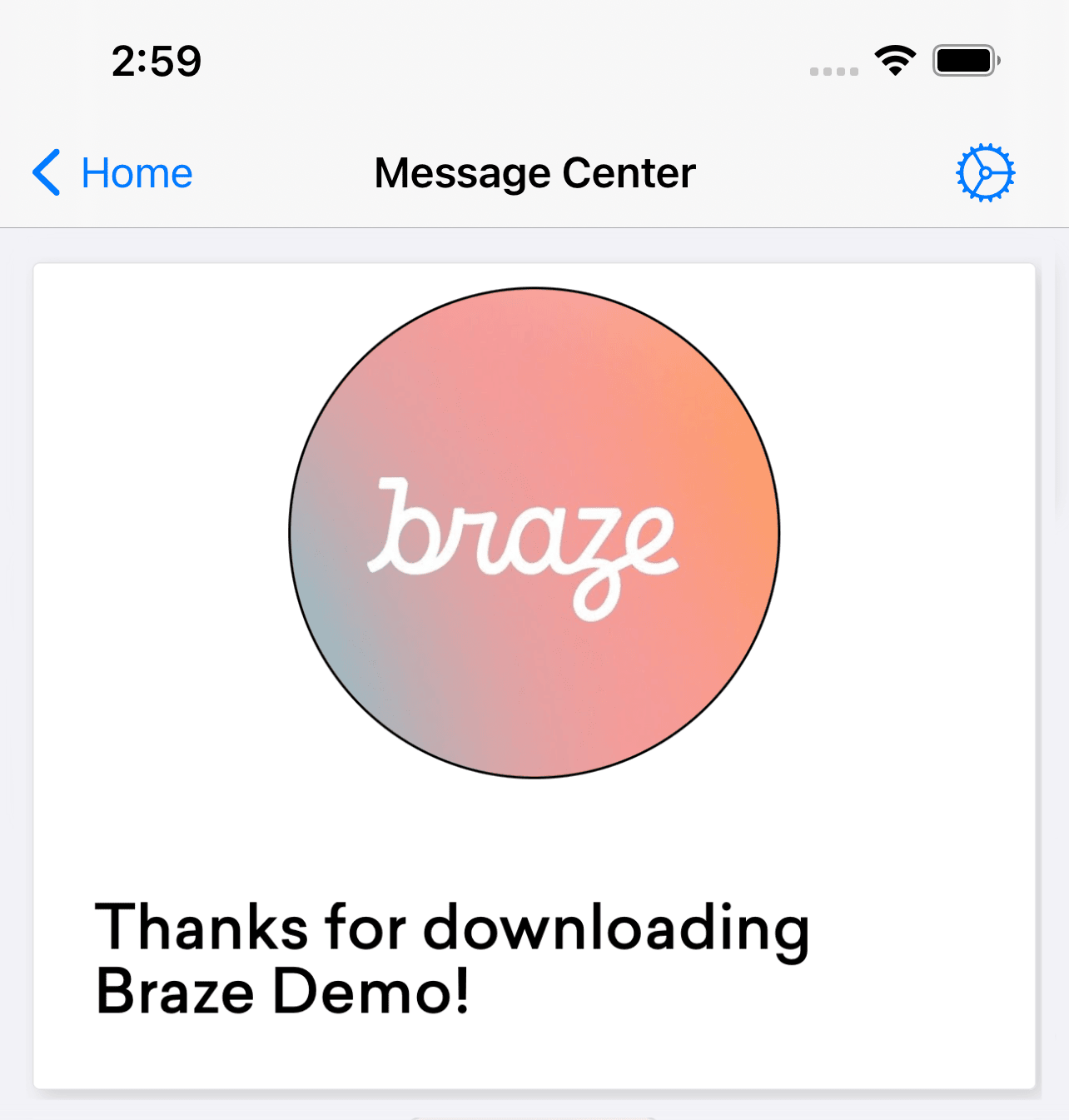 Eine klassische Content-Card. Eine klassische Content-Card zeigt ein Bild in der Mitte der Karte mit dem Text „Vielen Dank für den Download der Braze-Demo“ darunter.