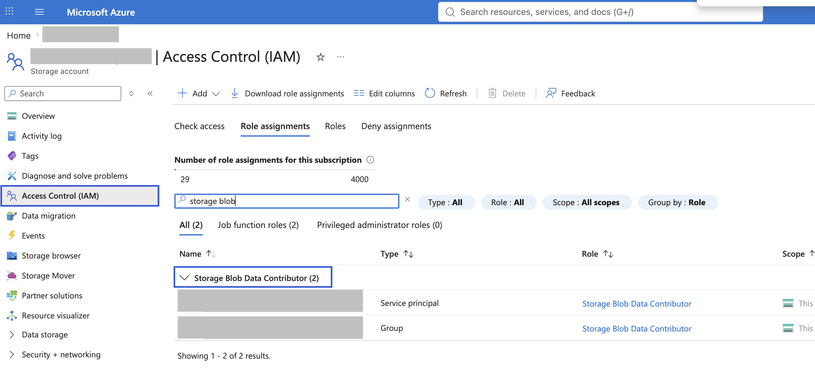 ストレージアカウントの Access Control (IAM) ロール割り当てタブ。サービスプリンシパルとグループに Storage Blob Data Contributor ロールが割り当てられています。